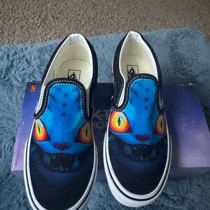 Vans Kids Blue k pop demon hunter Slip-On Sneakers with Yellow-Orange Eyes